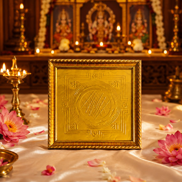 Close-up of Sri Chakra Yantra gold embossed frame with Shree and Om symbols