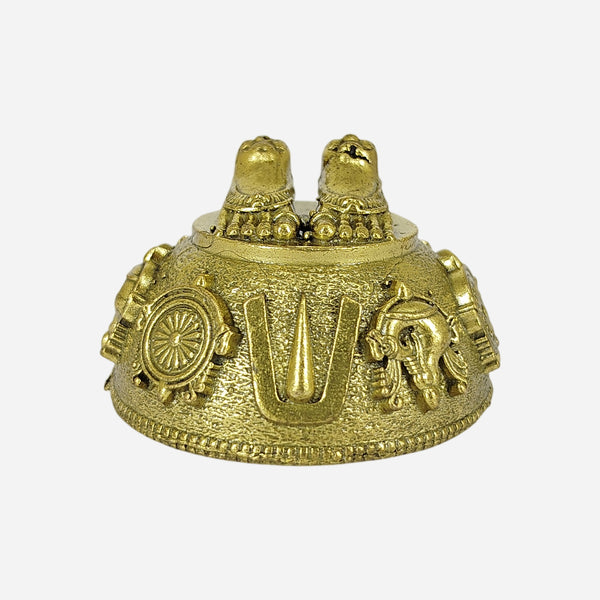 Brass Perumal Patham sacred feet idol on plain background