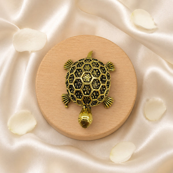 Top-down view of the brass kachua showing detailed honeycomb shell patterns.