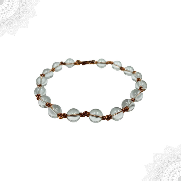 Detail view of genuine Clear Quartz Spadigam beads and artisanal copper wire wrapping.