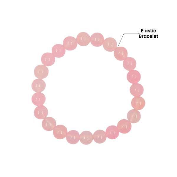 Elastic Rose Quartz healing bracelet featuring smooth, round pink crystal beads on a white background.