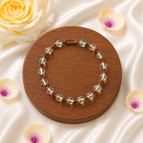 Detailed view of genuine Clear Quartz Spadigam beads and handcrafted artisanal copper wire-work.