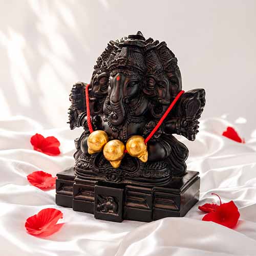 Karpaga Vinayagar fiber statue three-quarter view with golden beads