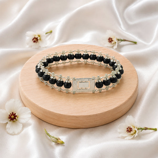 Premium Karungali ebony wood bracelet featuring an architectural white metal framework and secure box clasp.
