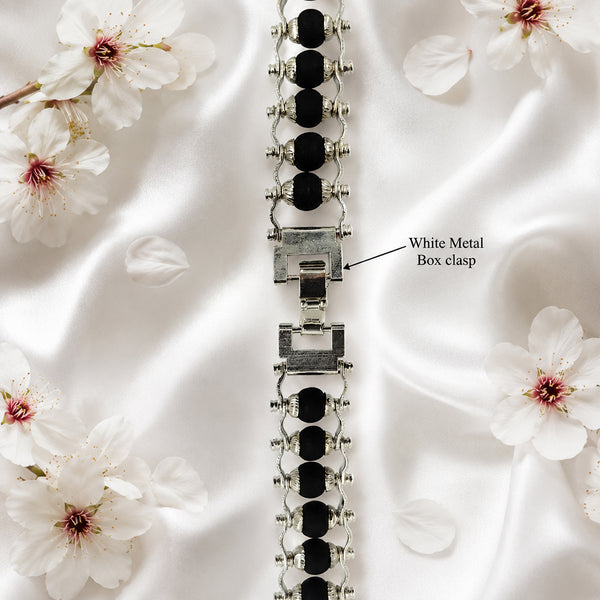 Detail view of the high-quality white metal box clasp on an original Karungali wood designer bracelet.