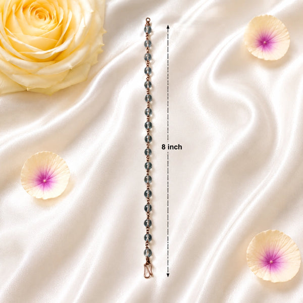 8-inch Spadigam Sphatik Clear Quartz bracelet featuring handcrafted copper wire wrapping on a silk background.