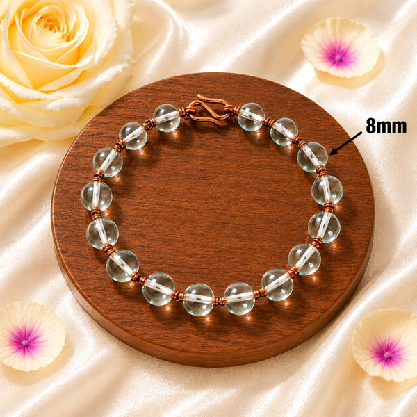 Detailed view of 8mm Spadigam Sphatik beads featuring a traditional secure copper hook clasp.