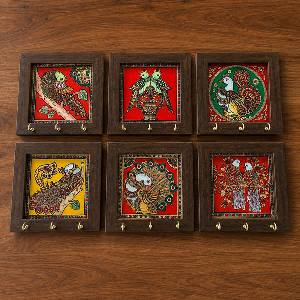 Set of six Tanjore art key hangers with different bird and peacock designs