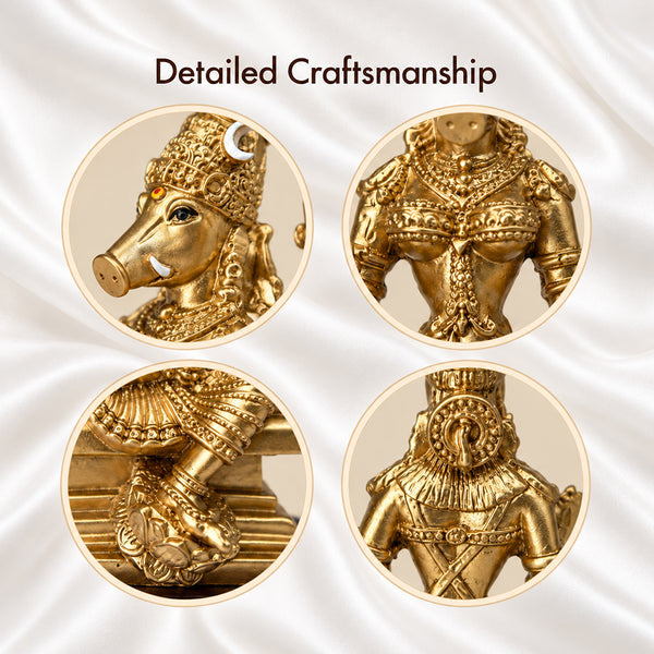 Close-up details of Varahi Amman statue: boar face, jewellery, back of the crown and lotus feet